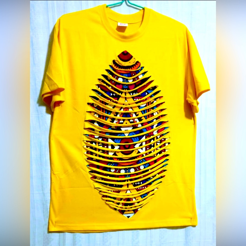 100% authentic African Ankara print T-shirt design. Made in Ghana 🇬🇭 .